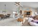 Spacious living room featuring vaulted ceilings, neutral tones, and a cozy seating area at 5050 W 102Nd Ave, Westminster, CO 80031