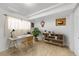 Bright home office featuring ample desk space and storage shelves for optimal productivity at 5050 W 102Nd Ave, Westminster, CO 80031