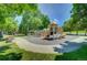 Well-maintained playground with slides and climbing structures in a park setting at 5050 W 102Nd Ave, Westminster, CO 80031