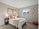Serene bedroom with soft decor, a comfortable bed, and a window offering natural light at 11650 Park South Ln, Parker, CO 80138
