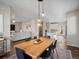 Inviting dining area connected to the living room and kitchen, perfect for entertaining at 11650 Park South Ln, Parker, CO 80138