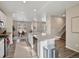 Open kitchen view includes a granite-topped island and an adjacent dining area with lots of natural light at 11650 Park South Ln, Parker, CO 80138