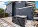 Backyard patio with hot tub, and wood fence at 19334 E Prentice Pl, Centennial, CO 80015