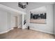 Spacious entryway featuring modern architecture, staircase, and open access to the kitchen at 19334 E Prentice Pl, Centennial, CO 80015