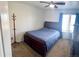 Bedroom with carpet floors, ceiling fan and natural lighting at 12578 Dexter Way, Thornton, CO 80241