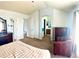 Cozy main bedroom featuring neutral paint, carpet and ample natural lighting at 12578 Dexter Way, Thornton, CO 80241