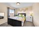 Cheerful bedroom with animal themed decor, sunny window, and a plush carpet at 7835 Canvasback Cir, Littleton, CO 80125