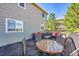 Spacious deck with outdoor dining table and comfortable seating perfect for entertaining and enjoying the outdoors at 7835 Canvasback Cir, Littleton, CO 80125