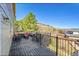 Relax on this spacious deck with wrought iron railing and comfortable seating, perfect for entertaining or enjoying the outdoors at 7835 Canvasback Cir, Littleton, CO 80125