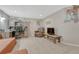 Finished basement space with a desk, workspace, and tile flooring at 3614 W Radcliff Ave, Denver, CO 80236