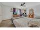 Spacious bedroom with neutral carpet and furniture at 3614 W Radcliff Ave, Denver, CO 80236