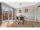 Cozy dining area with sliding door to the patio at 3614 W Radcliff Ave, Denver, CO 80236