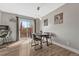 Modern dining area with slider door to patio at 3614 W Radcliff Ave, Denver, CO 80236