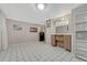Recreation room with tile flooring, cabinets, and bar area at 3614 W Radcliff Ave, Denver, CO 80236