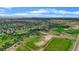 Aerial view of a neighborhood showcasing the landscape and community amenities at 113 Rockaway Ave, Castle Rock, CO 80104