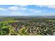 Aerial view showcasing the residential area, open spaces, and distant mountains at 113 Rockaway Ave, Castle Rock, CO 80104
