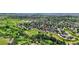 Beautiful aerial view of homes surrounded by trees, fields, and walking path at 113 Rockaway Ave, Castle Rock, CO 80104