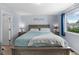 Charming bedroom with stylish decor, a comfortable bed, and a bright window at 113 Rockaway Ave, Castle Rock, CO 80104