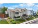 Charming two-story home featuring a well-maintained lawn and landscaped garden with a stepped walkway at 113 Rockaway Ave, Castle Rock, CO 80104