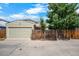 A single-Gathering home with a two-car garage and wooden fence in a well-kept neighborhood at 113 Rockaway Ave, Castle Rock, CO 80104