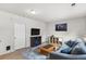 Cozy basement living room with comfortable seating and modern decor at 113 Rockaway Ave, Castle Rock, CO 80104