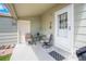 Cozy covered patio with seating, perfect for outdoor relaxation and entertaining at 113 Rockaway Ave, Castle Rock, CO 80104