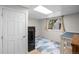 Bright room with a window, featuring a geometric rug and ample space for activities at 113 Rockaway Ave, Castle Rock, CO 80104