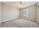 Bedroom with neutral paint, ceiling fan, plush carpet and a window with plantation shutters at 24487 E Frost Dr, Aurora, CO 80016