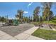 Well-equipped playground with various play structures, benches, and a safe, cushioned ground surface at 24487 E Frost Dr, Aurora, CO 80016
