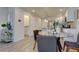 Charming dining area adjacent to the modern kitchen, perfect for entertaining friends or gathering with Gathering at 5863 N Boston St, Denver, CO 80238