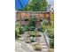 Charming garden showcasing a variety of flowers and plants in a serene outdoor setting at 5863 N Boston St, Denver, CO 80238