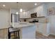 Modern kitchen featuring granite countertops, stainless steel appliances, and ample storage for the avid home chef at 5863 N Boston St, Denver, CO 80238