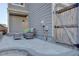 Back patio area with an outdoor seating, perfect for enjoying the peaceful backyard at 5863 N Boston St, Denver, CO 80238
