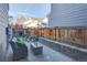 Back patio area with an outdoor seating, perfect for enjoying the peaceful backyard at 5863 N Boston St, Denver, CO 80238