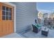 Cozy patio area with stylish outdoor furniture, perfect for relaxing and entertaining guests at 5863 N Boston St, Denver, CO 80238