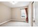 Bedroom featuring carpet, a window, and natural light at 8225 W 67Th Pl, Arvada, CO 80004