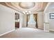 Spacious dining room with a chandelier and large window at 8225 W 67Th Pl, Arvada, CO 80004