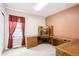 Home office with built in desk, window, and carpet at 8225 W 67Th Pl, Arvada, CO 80004