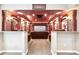 Spacious home theater boasts comfortable seating, projector, and movie posters at 8225 W 67Th Pl, Arvada, CO 80004