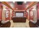 Luxurious home theater features comfortable seating and a large screen at 8225 W 67Th Pl, Arvada, CO 80004