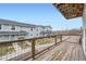 Balcony view of neighborhood homes and some landscaping at 6250 Everett Ct # F, Arvada, CO 80004