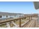 Balcony view of neighborhood homes and some landscaping at 6250 Everett Ct # F, Arvada, CO 80004