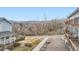 Exterior view from the balcony overlooking landscaping and a clear sky at 6250 Everett Ct # F, Arvada, CO 80004