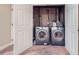 Laundry closet features side-by-side washer and dryer at 6250 Everett Ct # F, Arvada, CO 80004