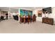 Finished basement offers a dining area and workout space with bright, modern decor at 4 Cherry Hills Farm Dr, Cherry Hills Village, CO 80113