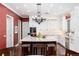 Open-concept kitchen with island, marble counters, pendant lighting, and stainless steel appliances at 4 Cherry Hills Farm Dr, Cherry Hills Village, CO 80113
