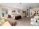 Large main bedroom with windows, ceiling fan, sitting area, and neutral decor at 4 Cherry Hills Farm Dr, Cherry Hills Village, CO 80113