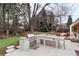 Spacious outdoor kitchen features a built-in grill and stainless steel storage at 4 Cherry Hills Farm Dr, Englewood, CO 80113