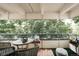 Charming balcony with seating, lush greenery, and a peaceful atmosphere at 1365 Columbine St # 204, Denver, CO 80206