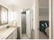 Well-lit bathroom features tiled countertops, updated fixtures, and a neutral color scheme at 1365 Columbine St # 204, Denver, CO 80206